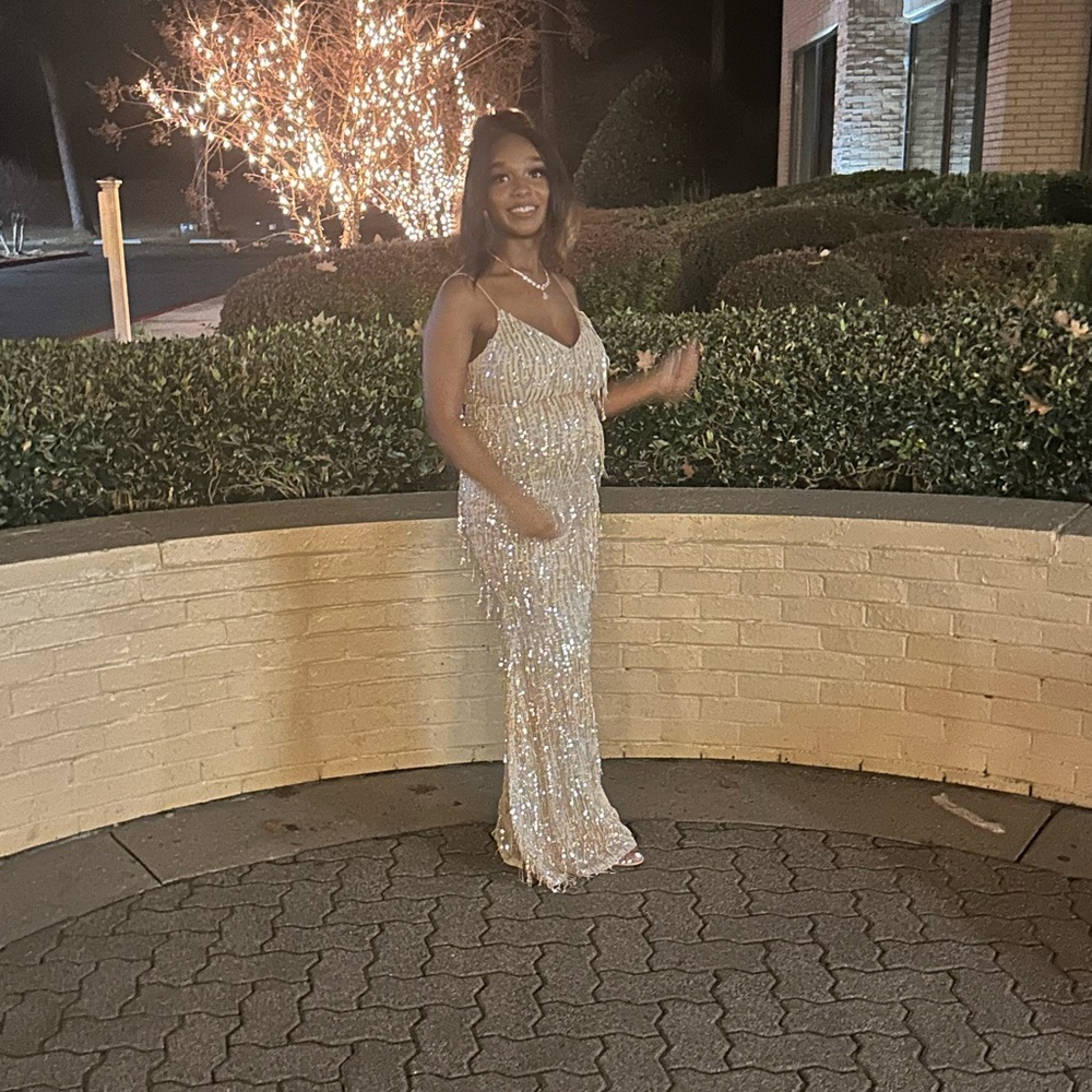 True eye catcher sparkle dress. Although pregnant, it will fit anyone petite.